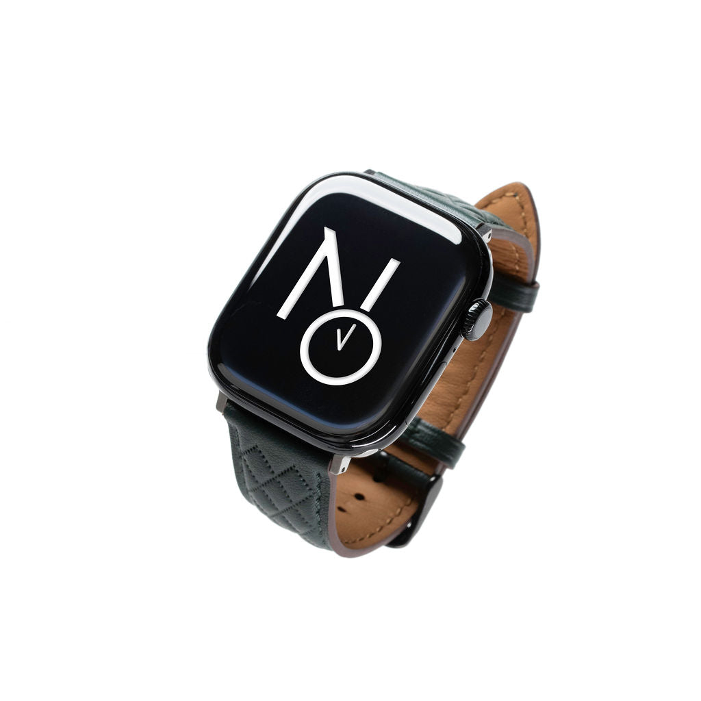 Mønstret skinnreim til Apple mørk grønn