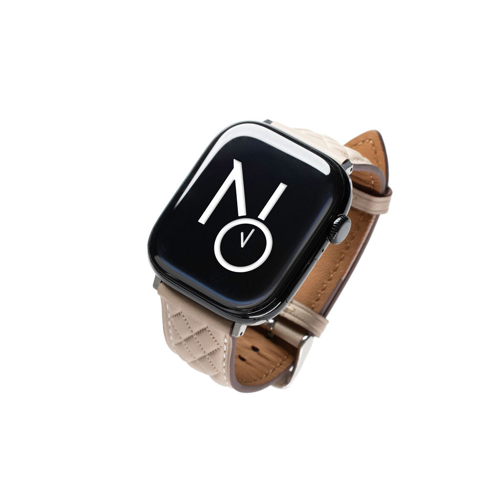 Mønstret skinnreim til Apple lys beige